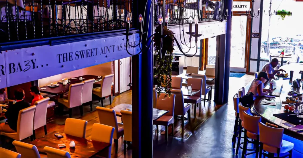 Visitors enjoying dining and nightlife in the West End Historic District of Dallas.